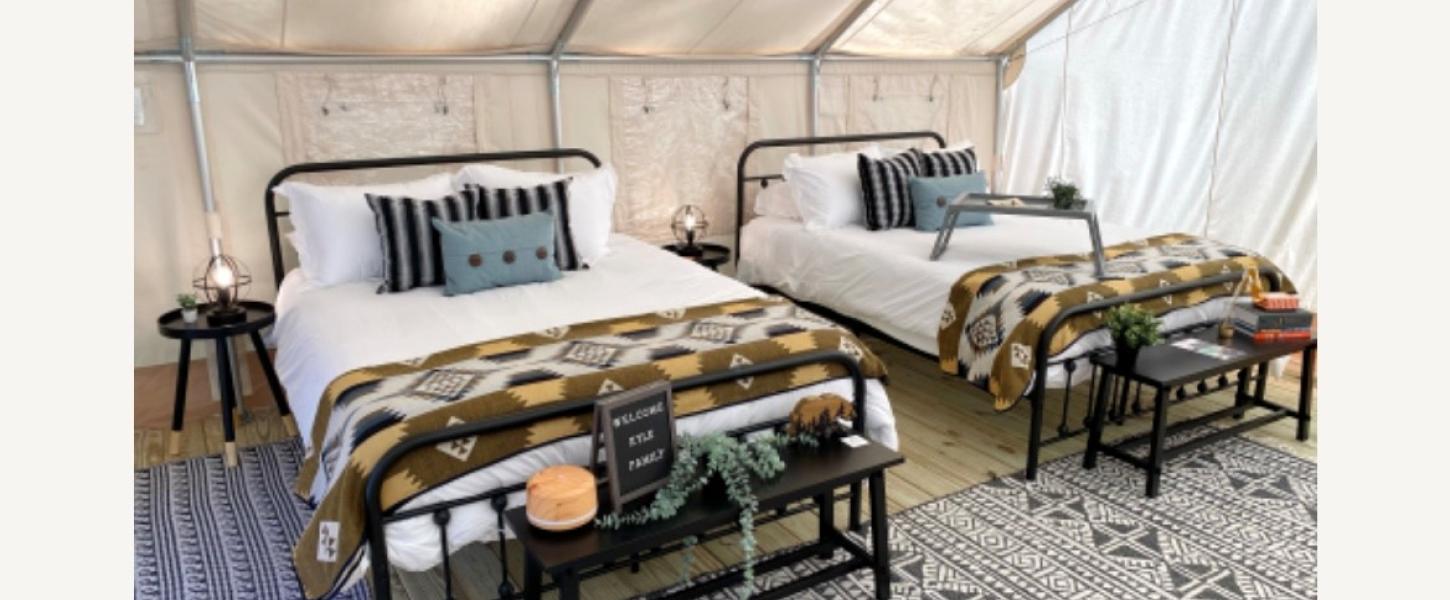 Two beds inside the glamping tent at Hillsborough River State Park.